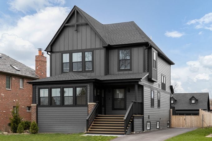 Featured Listings Does Painting Your House A Dark Color Make It Warmer GettyImages 1450652928 1